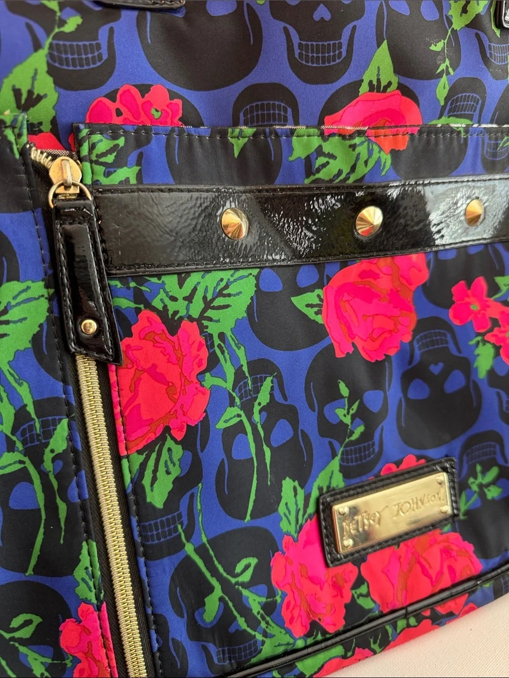 Betsey Johnson Blue Floral Skull Laptop Bag with Pink and Green Accents
